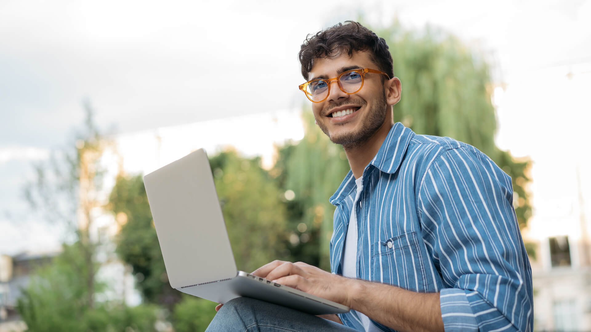 image of a student with laptop